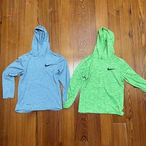 Two kids Nike hooded long sleeve tops.  Both size small.  Good condition.